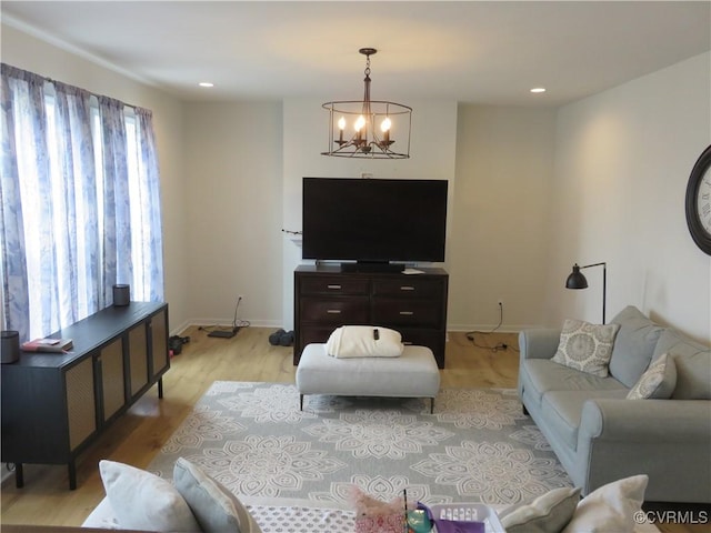 7617 Royal Crown Ct, Mechanicsville, VA 23116 - living room featuring light wood-style floors, a chandelier, baseboards, and recessed lighting