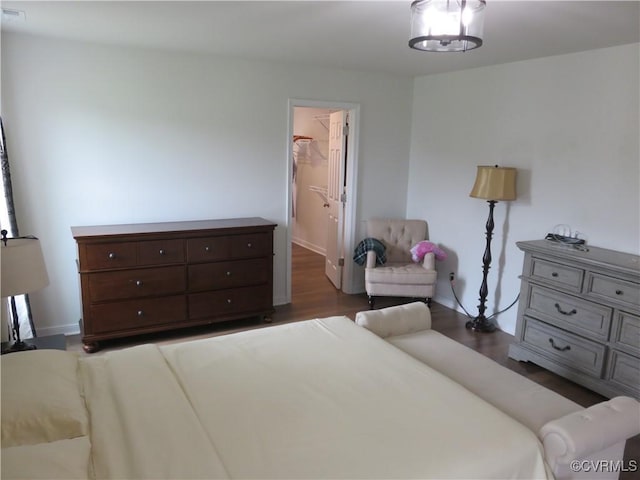 7617 Royal Crown Ct, Mechanicsville, VA 23116 - bedroom featuring dark wood-type flooring and baseboards