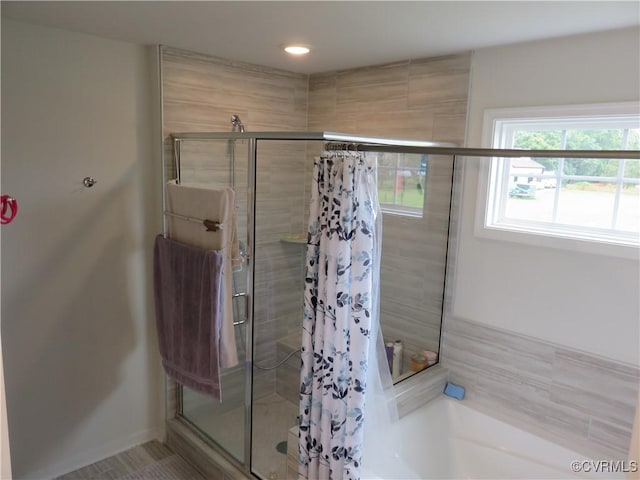 7617 Royal Crown Ct, Mechanicsville, VA 23116 - full bathroom with a stall shower, a garden tub, baseboards, and recessed lighting