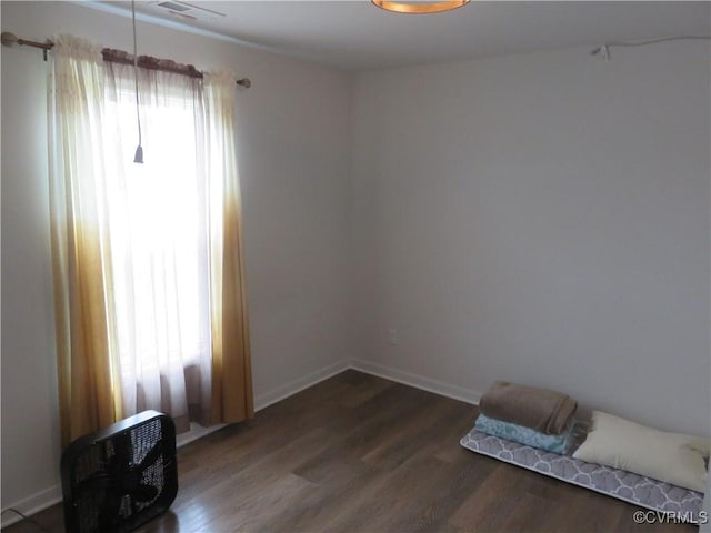 7617 Royal Crown Ct, Mechanicsville, VA 23116 - empty room with dark wood finished floors and baseboards