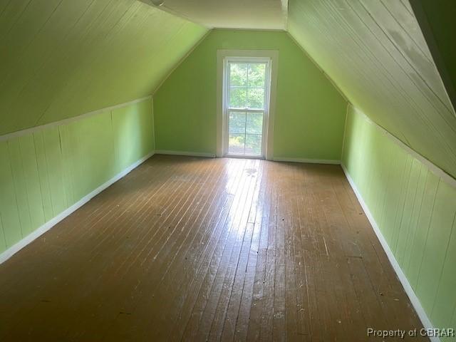 2784 Kings Creek Rd, Hayes, VA 23072 - additional living space with hardwood / wood-style floors, vaulted ceiling, and baseboards