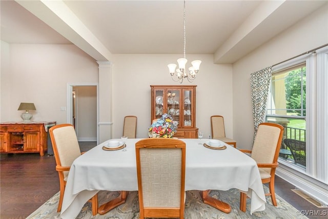 17231 Ivory Bill Ln, Chesterfield, VA 23838 - dining room featuring a chandelier and dark wood-style flooring