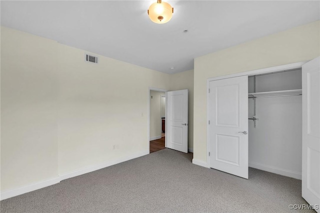 4250 Granby St Unit 105, Norfolk, VA 23504 - unfurnished bedroom with carpet floors, baseboards, and a closet