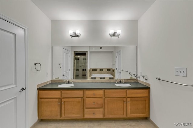 4250 Granby St Unit 105, Norfolk, VA 23504 - bathroom featuring double vanity, a stall shower, tile patterned flooring, and baseboards