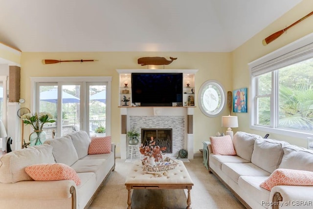 109 Vreeland Dr, Yorktown, VA 23692 - living room with a stone fireplace and light carpet
