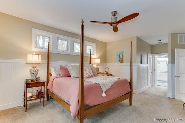 109 Vreeland Dr, Yorktown, VA 23692 - bedroom featuring a wainscoted wall, light carpet, and ceiling fan