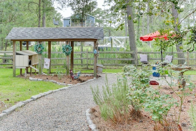 109 Vreeland Dr, Yorktown, VA 23692 - view of yard with exterior structure and an outbuilding