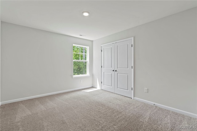 16831 Barmer Rd, Chesterfield, VA 23838 - unfurnished bedroom with carpet, baseboards, and a closet
