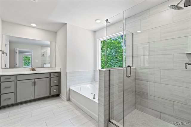 16831 Barmer Rd, Chesterfield, VA 23838 - full bathroom with vanity, a shower stall, a bath, and plenty of natural light