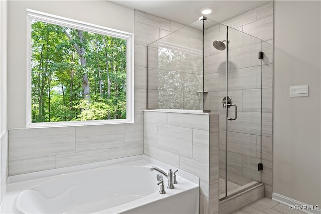 16831 Barmer Rd, Chesterfield, VA 23838 - full bathroom with a garden tub, a stall shower, and plenty of natural light