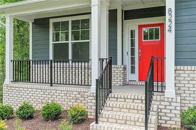 16831 Barmer Rd, Chesterfield, VA 23838 - doorway to property featuring covered porch