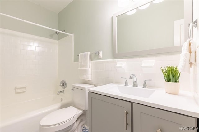 2214 Parkside Ave, Henrico, VA 23228 - full bath with toilet, vanity,  shower combination, tile walls, and wainscoting