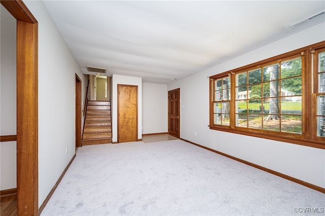 10216 Greglynn Rd, North Chesterfield, VA 23236 - spare room with light carpet, baseboards, and stairs