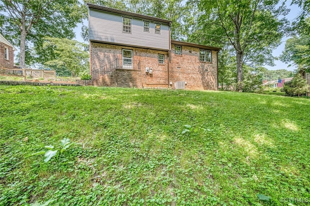 10216 Greglynn Rd, North Chesterfield, VA 23236 - rear view of house featuring brick siding and cooling unit