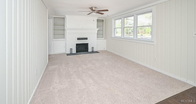 10486 Malboro Rd, Hanover, VA 23116 - unfurnished living room with a ceiling fan, carpet floors, and a large fireplace