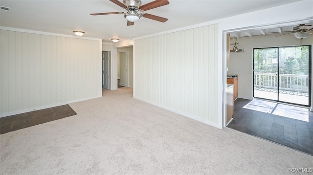 10486 Malboro Rd, Hanover, VA 23116 - carpeted spare room with ceiling fan, baseboards, and wooden walls