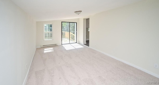 10486 Malboro Rd, Hanover, VA 23116 - spare room featuring a baseboard radiator, carpet, baseboards, and vaulted ceiling