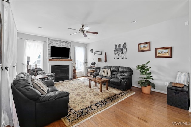 14300 Wallingham Loop, Midlothian, VA 23114 - living area featuring wood finished floors, ceiling fan, a fireplace, baseboards, and recessed lighting