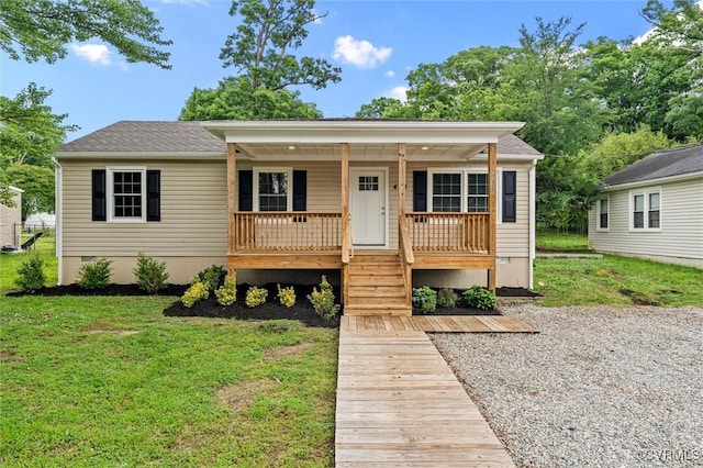 425 S 20th Ave, Hopewell, VA 23860 - view of front facade featuring covered porch, a front lawn, and crawl space