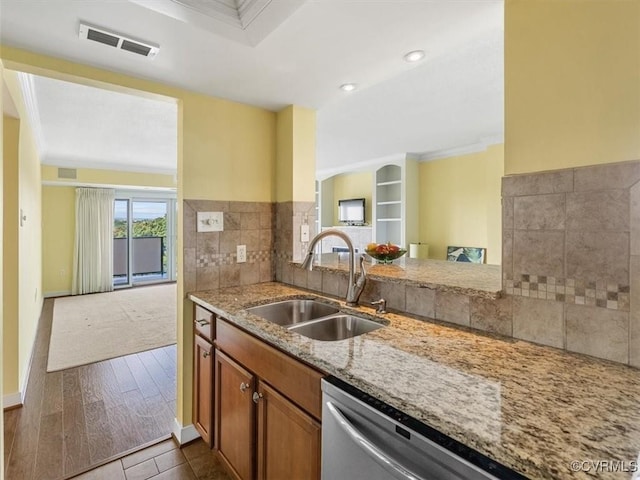 2956 Hathaway Rd Unit U1205, Richmond, VA 23225 - kitchen featuring a sink, light stone counters, dishwasher, brown cabinetry, and ornamental molding