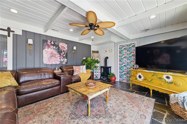 290 Circle Dr, Port Haywood, VA 23138 - living room with a wood stove, ceiling fan, recessed lighting, a barn door, and a wooden ceiling with exposed beams