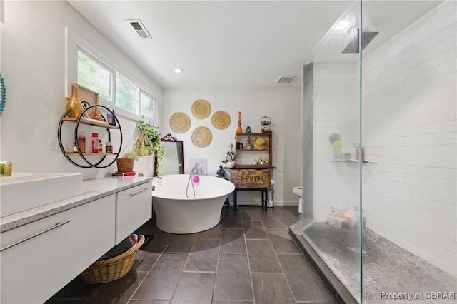 290 Circle Dr, Port Haywood, VA 23138 - full bath featuring vanity, a tile shower, a soaking tub, and recessed lighting