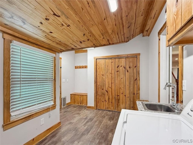 29898 The Trl, Shacklefords, VA 23110 - washroom with cabinet space, wood finished floors, washer / clothes dryer, wooden ceiling, and baseboards
