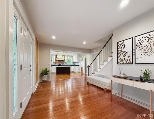 29898 The Trl, Shacklefords, VA 23110 - entrance foyer featuring stairway, light wood-style floors, and recessed lighting