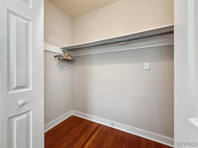 29898 The Trl, Shacklefords, VA 23110 - walk in closet with dark wood-type flooring