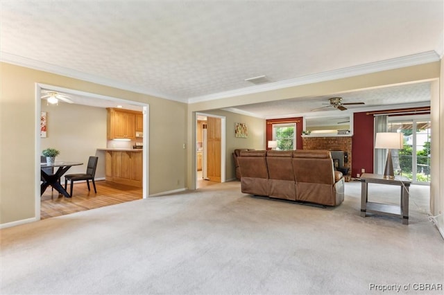 1 Beacon Cir, Hampton, VA 23664 - living room with light carpet, crown molding, a ceiling fan, and baseboards
