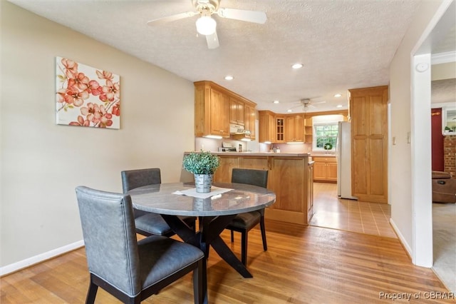 1 Beacon Cir, Hampton, VA 23664 - dining area featuring a ceiling fan, light wood finished floors, baseboards, recessed lighting, and a textured ceiling