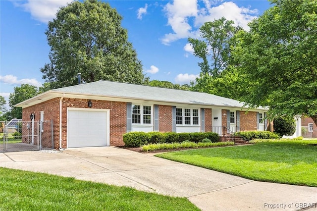 1 Beacon Cir, Hampton, VA 23664 - ranch-style home with a garage, brick siding, concrete driveway, and a gate