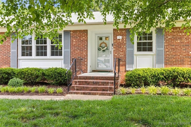 1 Beacon Cir, Hampton, VA 23664 - property entrance with brick siding and a yard