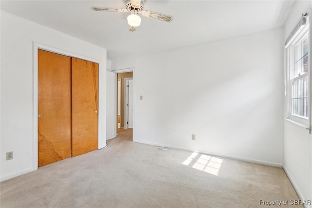 1 Beacon Cir, Hampton, VA 23664 - unfurnished bedroom with carpet floors, a closet, baseboards, and ceiling fan