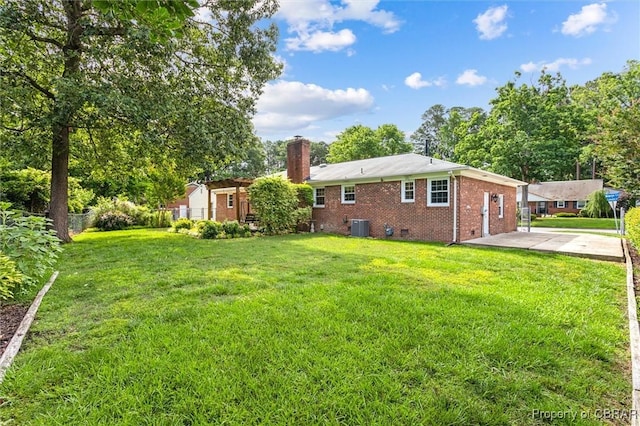 1 Beacon Cir, Hampton, VA 23664 - rear view of house with brick siding, central AC, a chimney, a patio, and crawl space