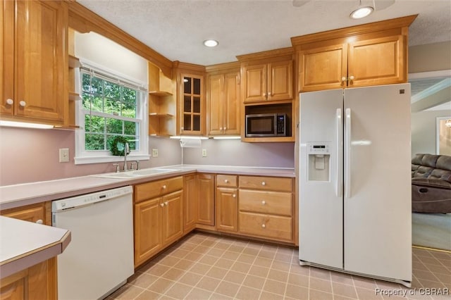 1 Beacon Cir, Hampton, VA 23664 - kitchen with white appliances, a sink, light countertops, recessed lighting, and glass insert cabinets