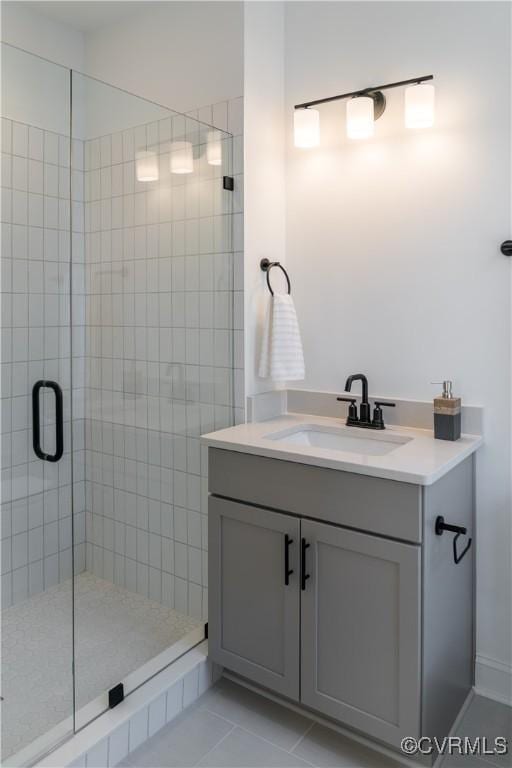 425 W 7th St, Richmond, VA 23224 - bathroom featuring a stall shower, vanity, and tile patterned flooring