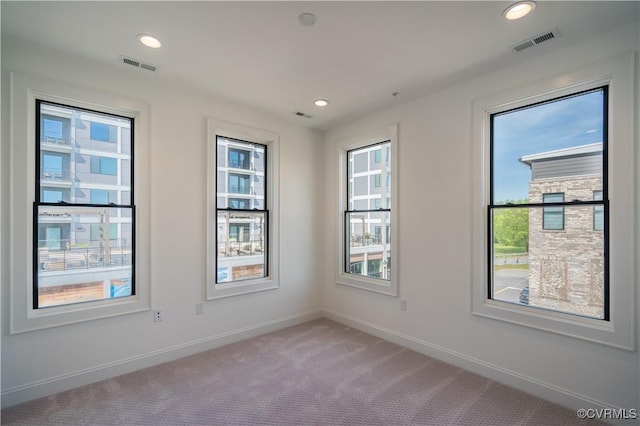 425 W 7th St, Richmond, VA 23224 - carpeted empty room featuring baseboards and recessed lighting