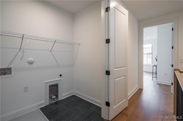 425 W 7th St, Richmond, VA 23224 - laundry room with washer hookup, hookup for an electric dryer, hookup for a gas dryer, dark wood-type flooring, and baseboards