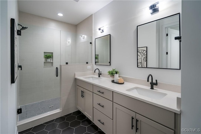 425 W 7th St, Richmond, VA 23224 - full bathroom with double vanity, tile patterned flooring, a stall shower, and recessed lighting
