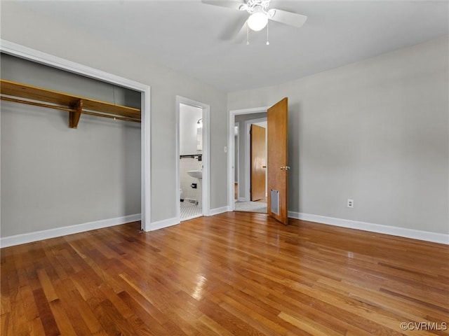 3301 Warsaw Ave, Hopewell, VA 23860 - unfurnished bedroom featuring wood finished floors, a closet, and a ceiling fan