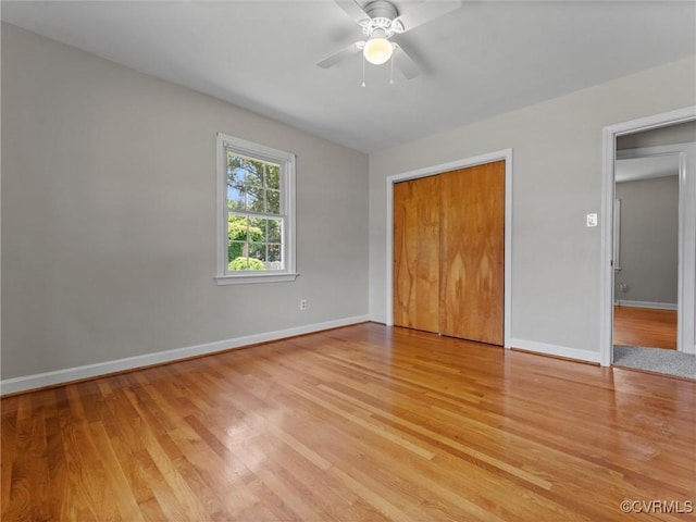 3301 Warsaw Ave, Hopewell, VA 23860 - unfurnished bedroom with light wood finished floors, a closet, and a ceiling fan