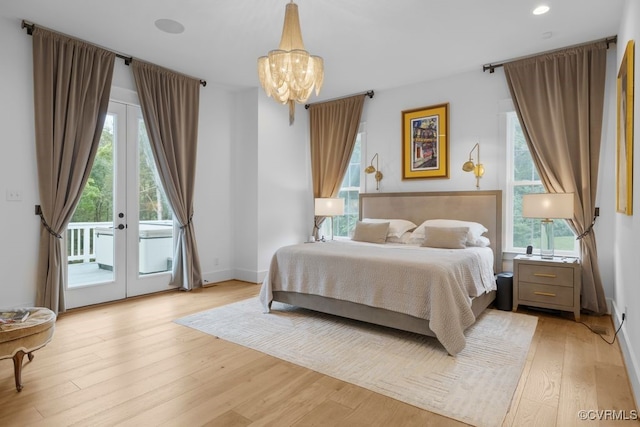 547 River Rd, Manakin Sabot, VA 23103 - bedroom with access to outside, a chandelier, light wood-type flooring, and recessed lighting