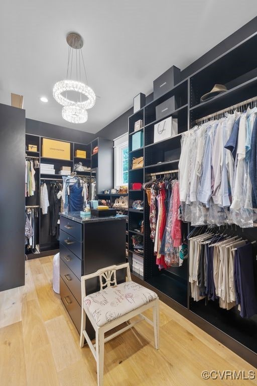 547 River Rd, Manakin Sabot, VA 23103 - walk in closet with a chandelier and light wood-style floors