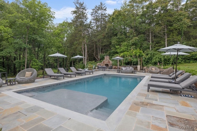 547 River Rd, Manakin Sabot, VA 23103 - swimming pool featuring a patio area and an outdoor living space with a fireplace