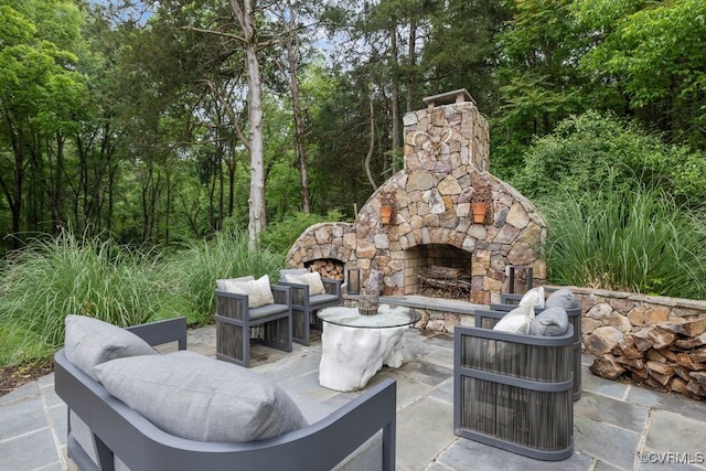 547 River Rd, Manakin Sabot, VA 23103 - view of patio / terrace featuring an outdoor stone fireplace