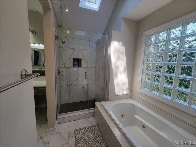 113 Comstock Dr, Colonial Heights, VA 23834 - bathroom with marble look tiles, a whirlpool tub, a shower stall, vanity, and a skylight