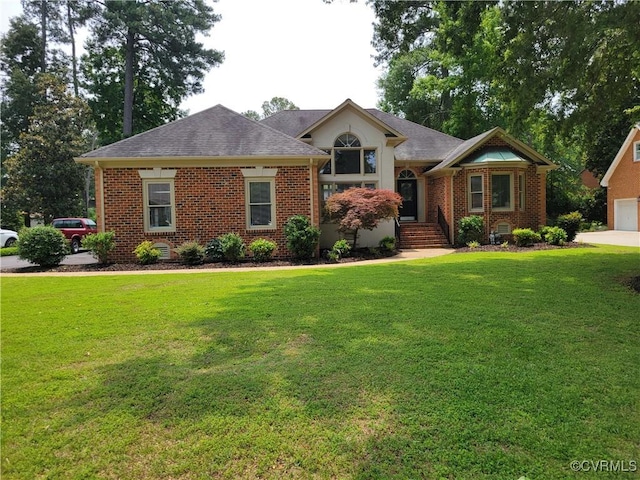 113 Comstock Dr, Colonial Heights, VA 23834 - view of front of home with a front lawn and brick siding