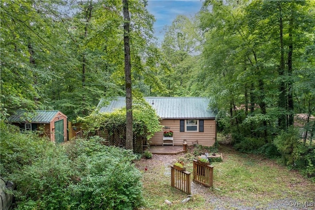 198 Trices Lake Rd, Columbia, VA 23038 - view of yard with a wooded view