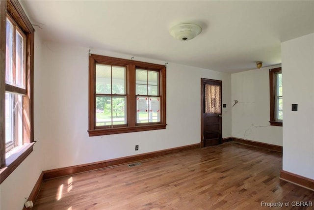 708 Calthrop Neck Rd, Yorktown, VA 23693 - spare room featuring wood finished floors and baseboards